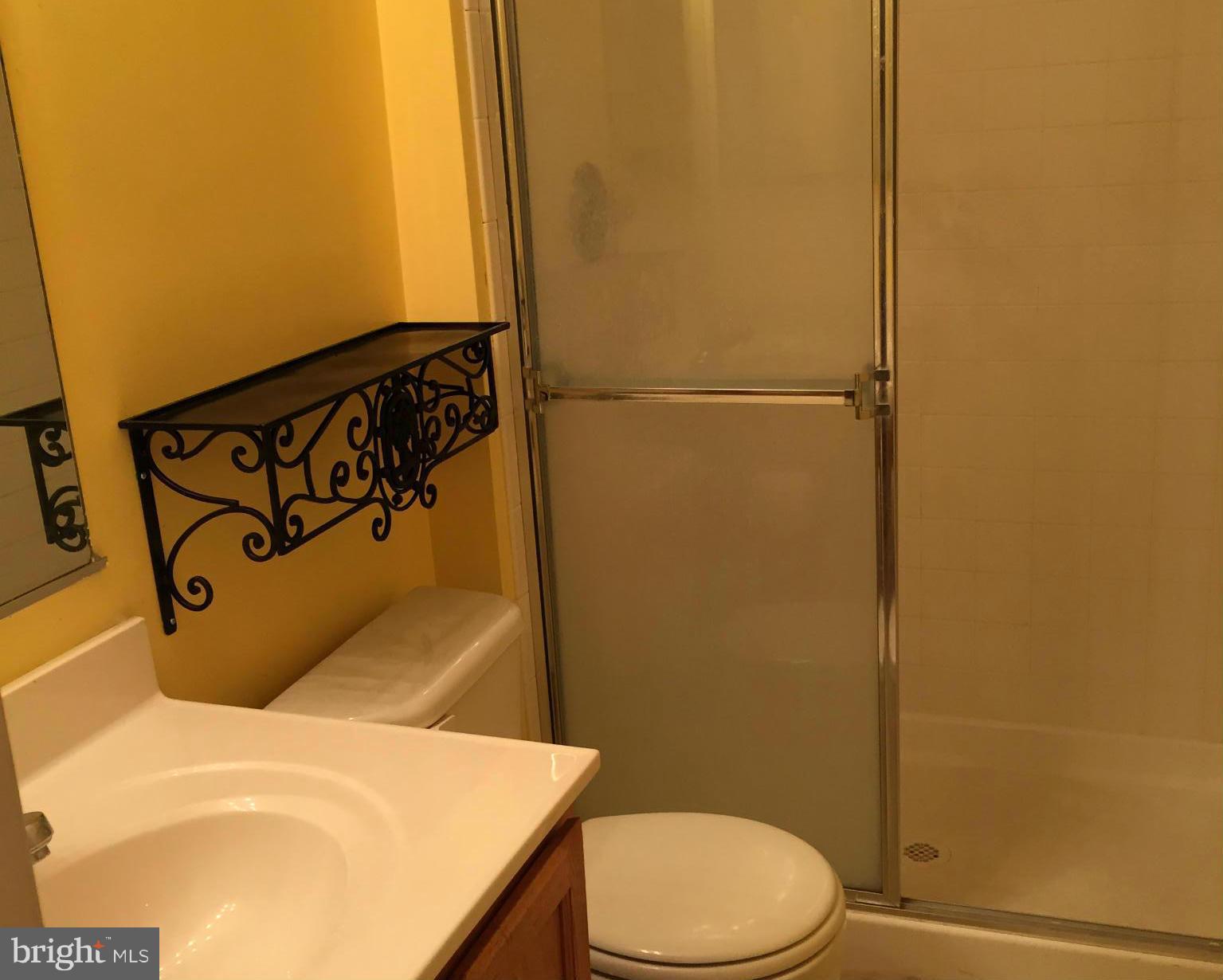 116 Commodore Drive Baltimore, MD 21221 - Photo 25 of 25 a bathroom with a sink and toilet