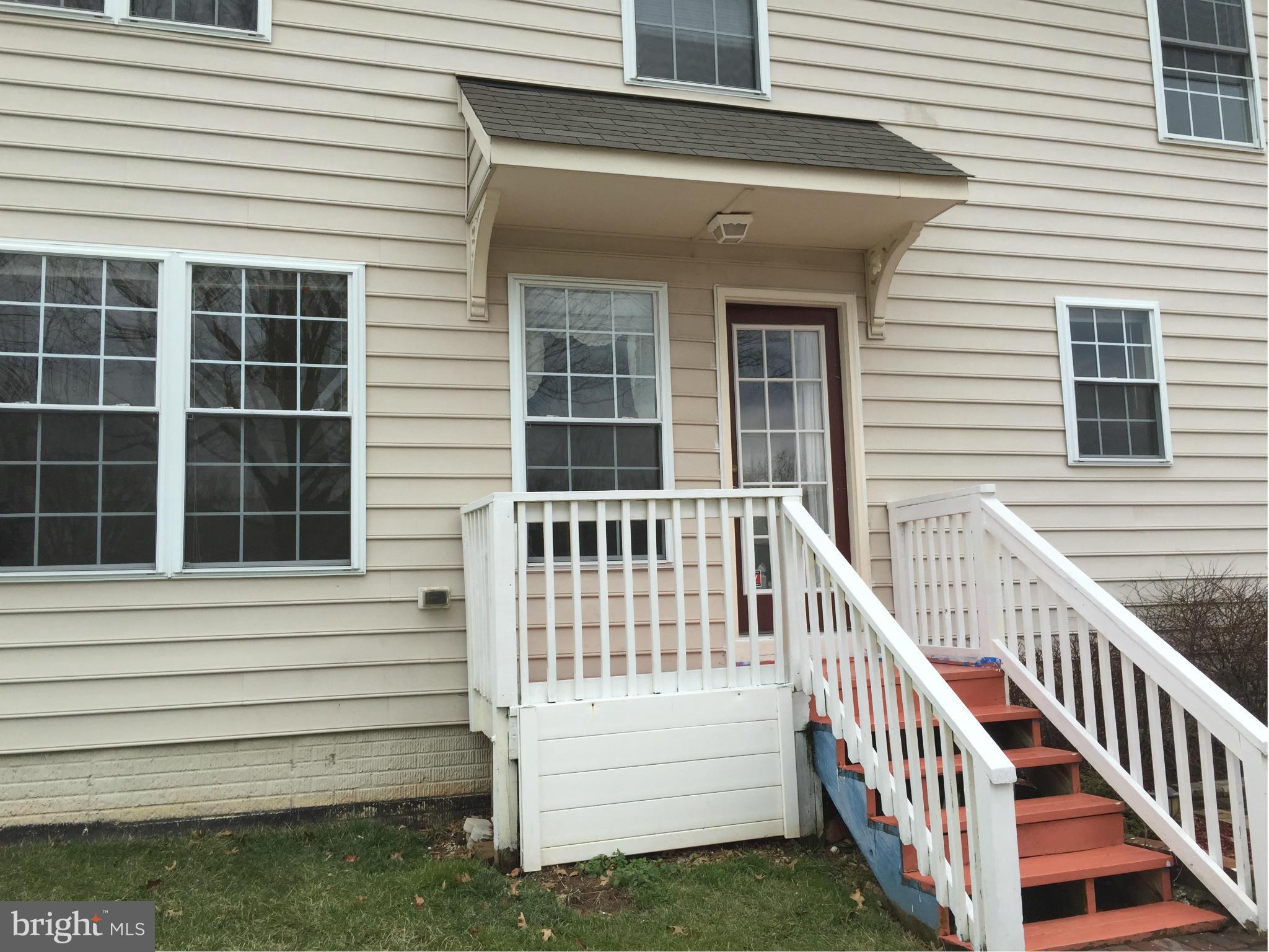 116 Commodore Drive Baltimore, MD 21221 - Photo 5 of 25 a view of a house with a deck