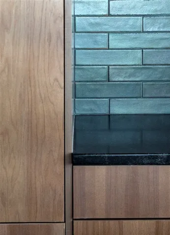 a bedroom with a bed and a night stand