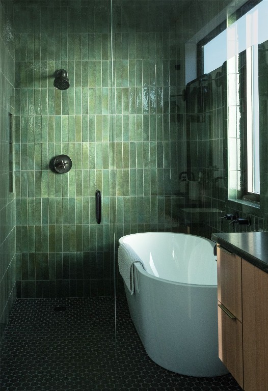 9361 Highway 290, Unit 107 Hye, TX 78635 - Photo 23 of 40 a bathroom with a bathtub and a shower