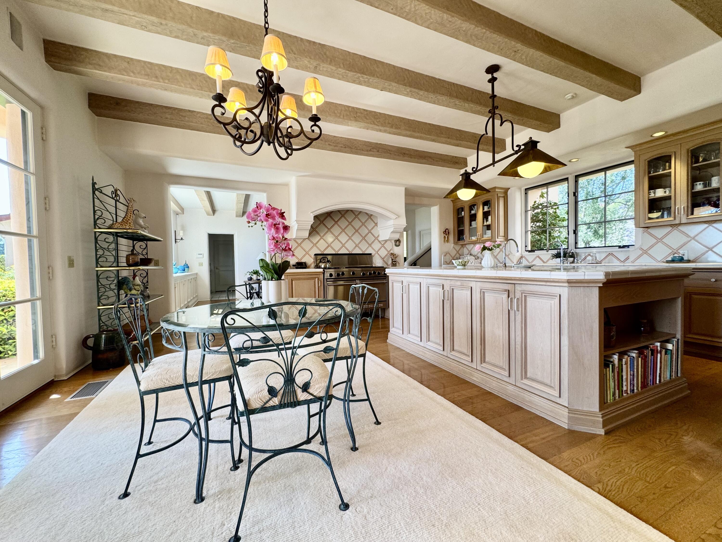 2240 Ortega Ranch Road Summerland, CA 93067 - Photo 32 of 93 a view of a dining room with furniture wooden floor and chandelier