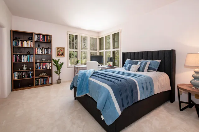 a view of a large body of water with a building in the background