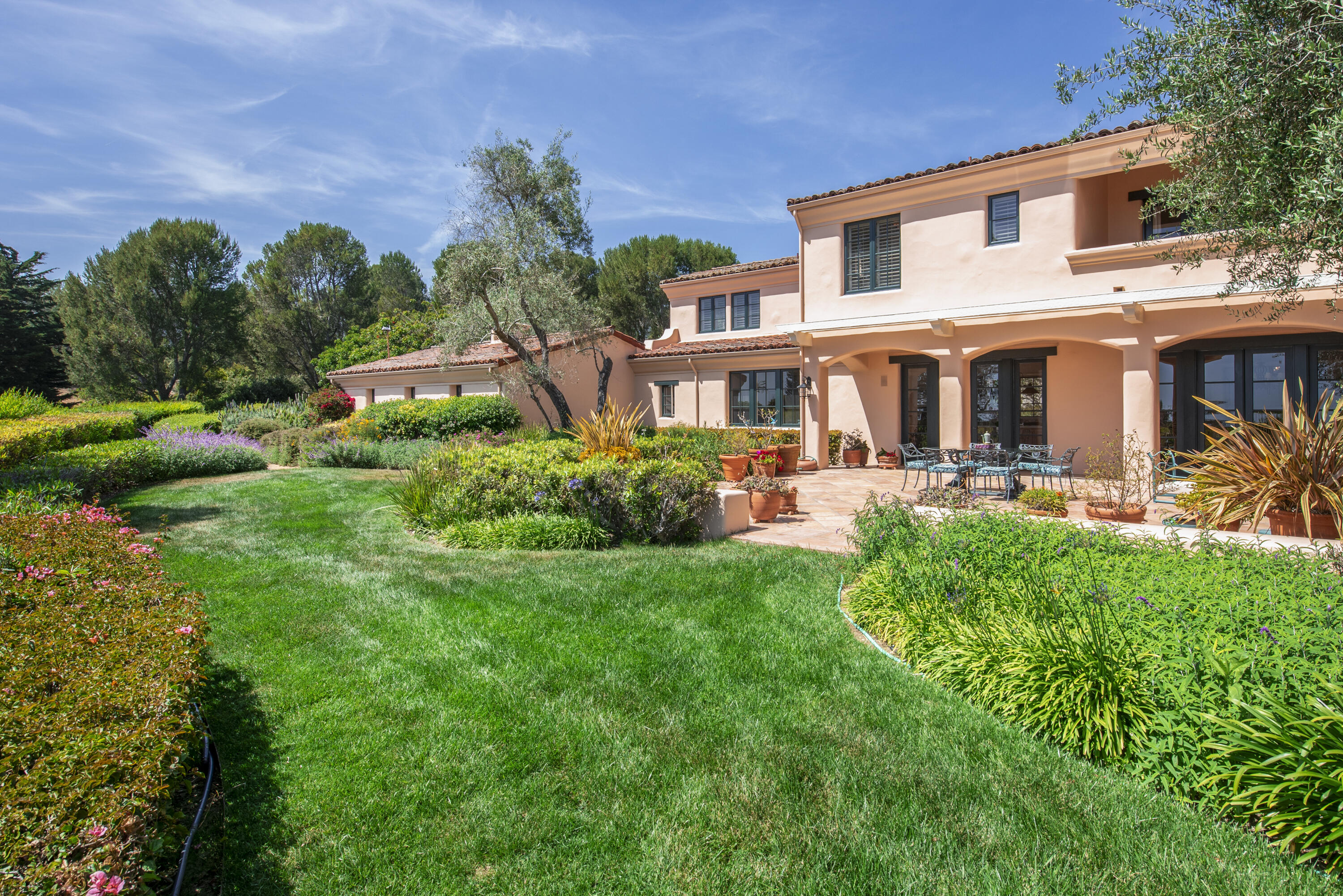 2240 Ortega Ranch Road Summerland, CA 93067 - Photo 69 of 93 a front view of a house with garden and trees