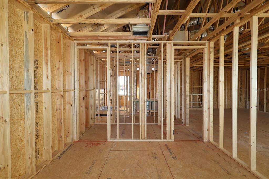 17036 Overstory Road Orlando, FL 32820 - Photo 2 of 19 a view of a porch with wooden floor