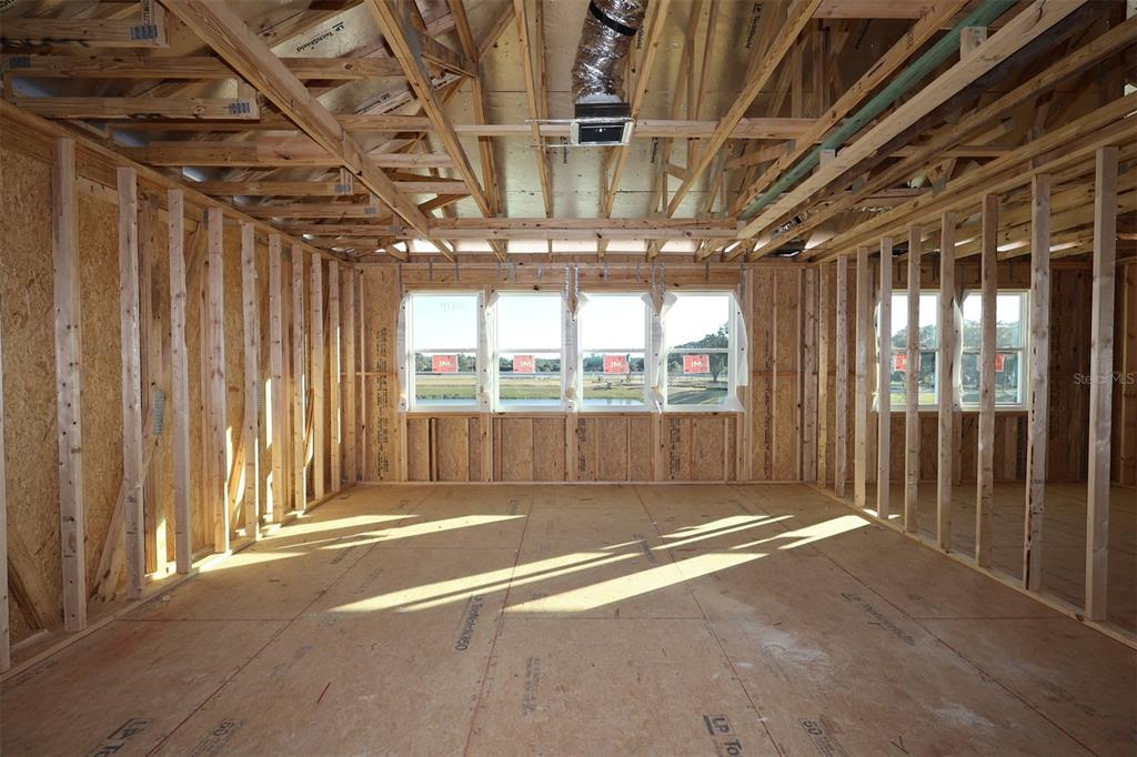 17036 Overstory Road Orlando, FL 32820 - Photo 3 of 19 a view of an empty room with a balcony
