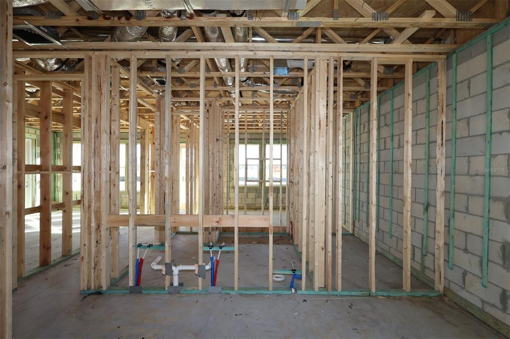 17036 Overstory Road Orlando, FL 32820 - Photo 9 of 19 a view of front door with outdoor seating