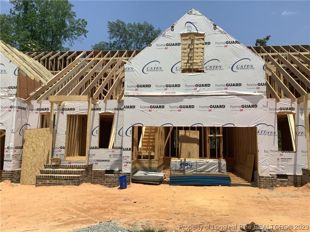 154 Lark Drive Pinehurst, NC 27376 - Photo 2 of 2 a view of a building with a street