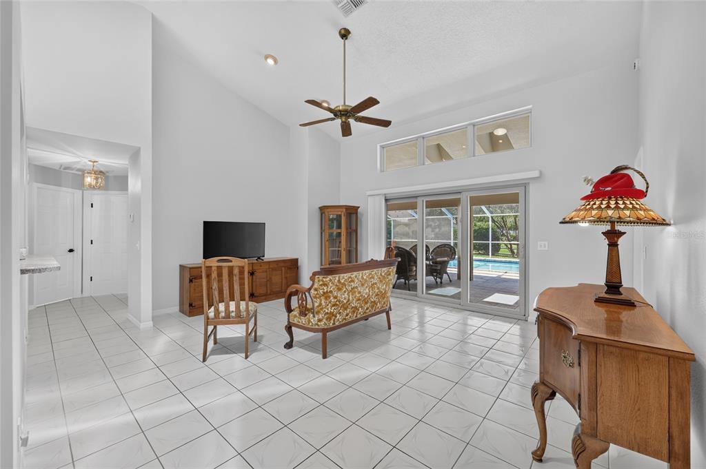19025 Southwest 98th Loop Dunnellon, FL 34432 - Photo 17 of 80 a living room with furniture