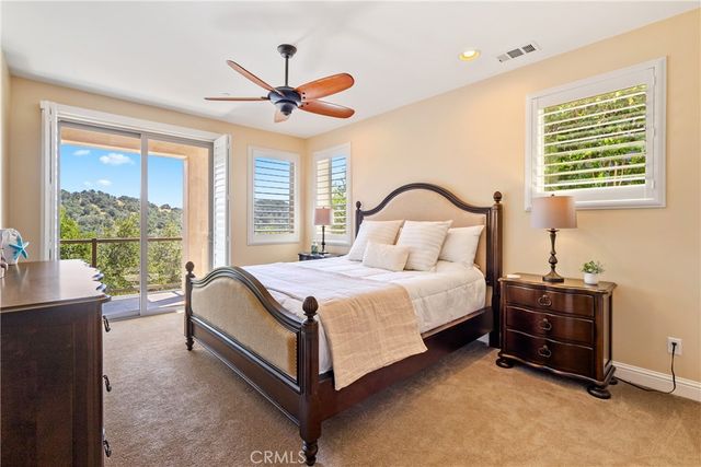 a view of balcony with furniture