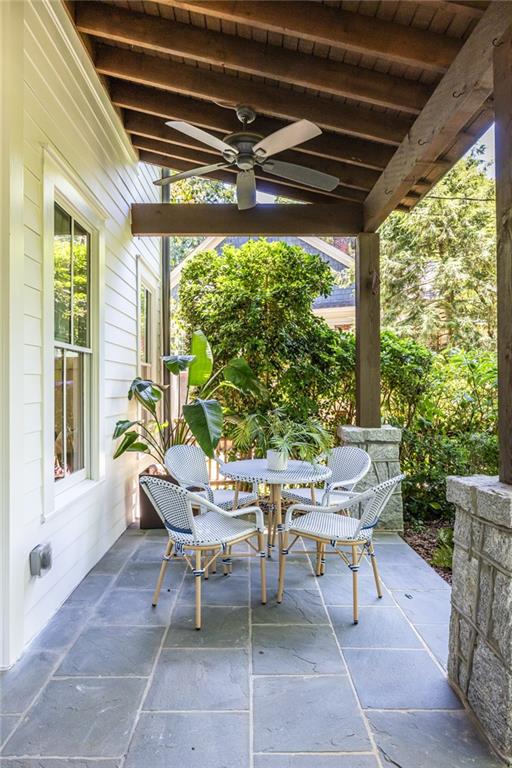 538 Ansley Street Decatur, GA 30030 - Photo 3 of 73 a view of a patio with table and chairs and potted plants