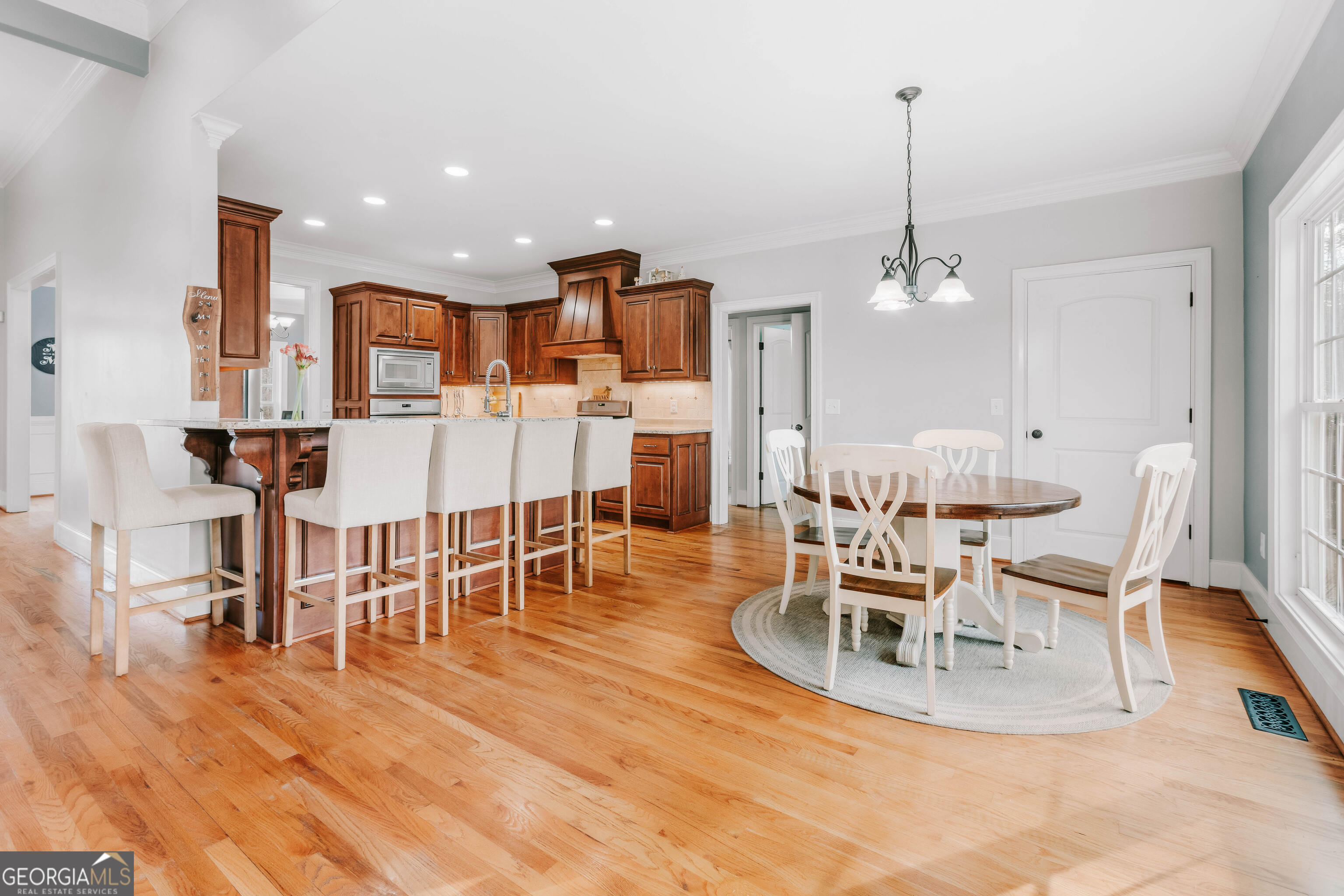 1001 Highpoint Lane Bogart, GA 30622 - Photo 20 of 49 a view of a dining room with furniture