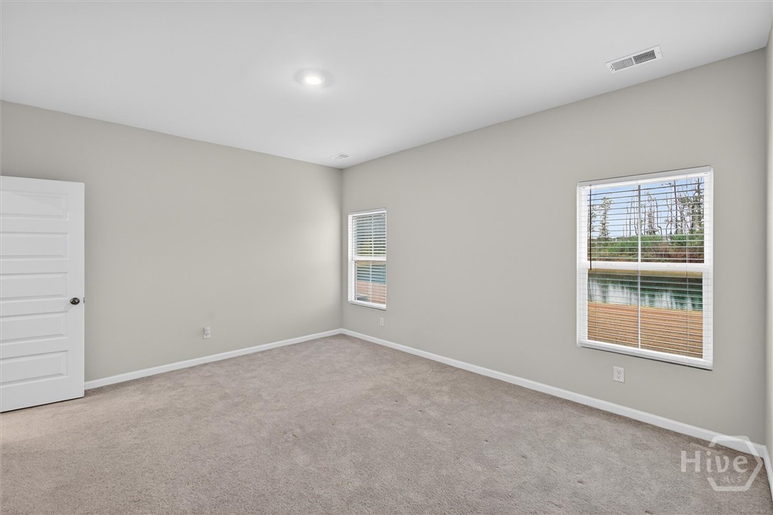 312 Lillian Street Rincon, GA 31326 - Photo 22 of 40 Pond views from the primary bedroom.