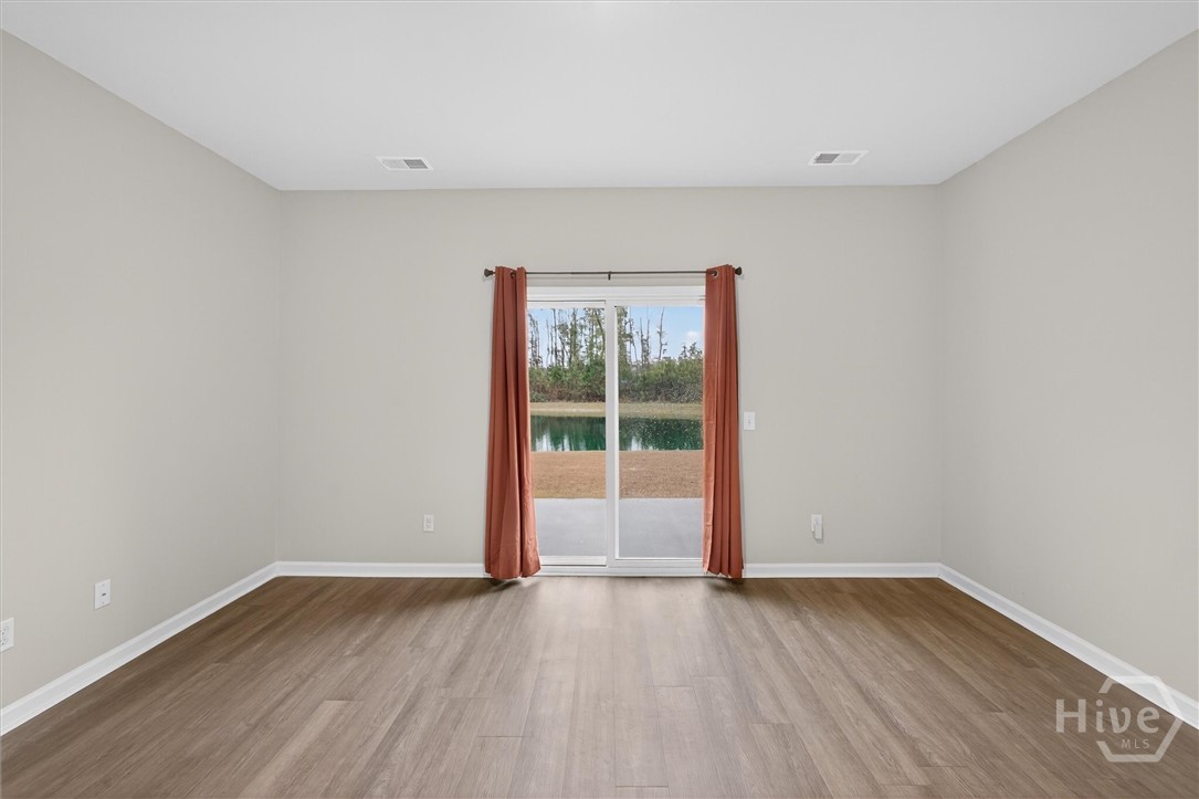 312 Lillian Street Rincon, GA 31326 - Photo 9 of 40 Pond views from the living room.