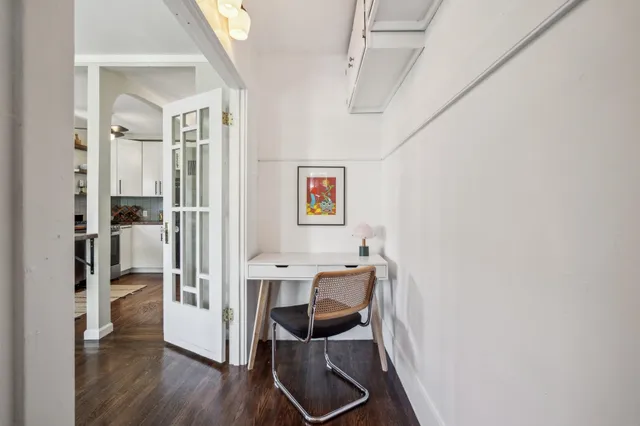 a room with furniture and wooden floor