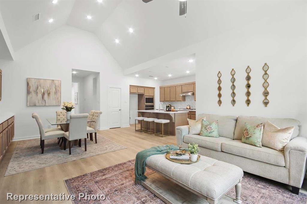413 Heritage Rnch Trail Sherman, TX 75092 - Photo 18 of 30 a living room with furniture kitchen view and a table