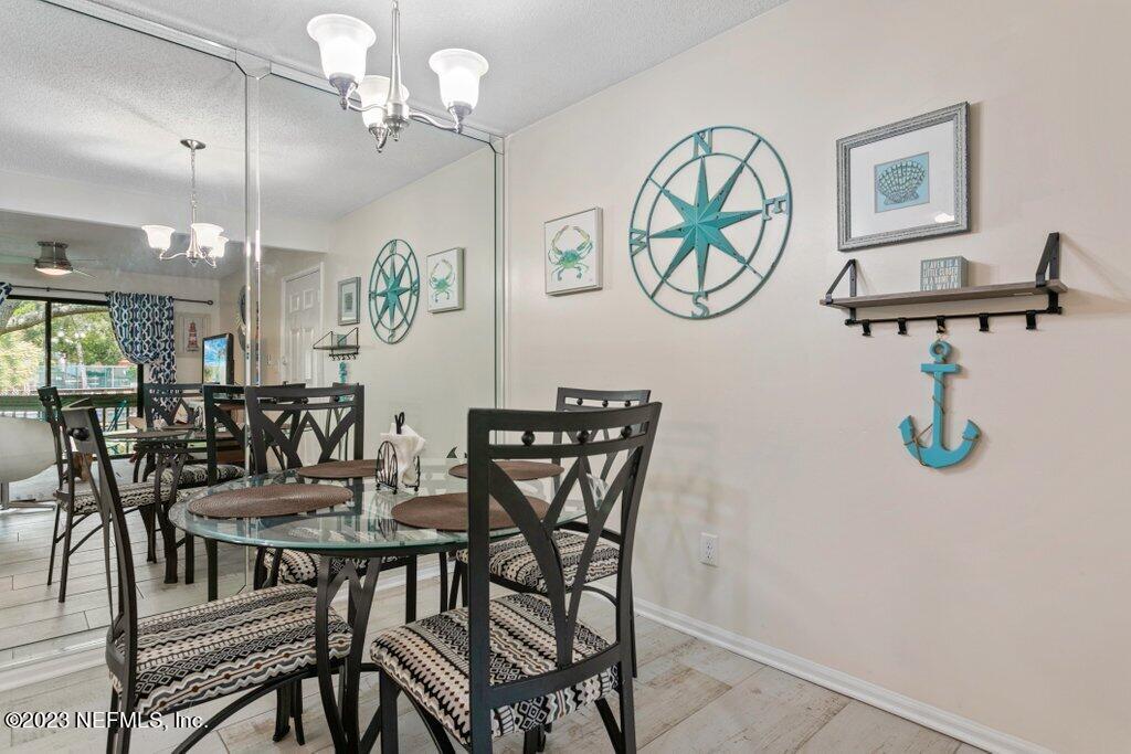 2694 Forest Ridge Drive, Unit 4A Fernandina Beach, FL 32034 - Photo 12 of 38 a view of a dining room with furniture