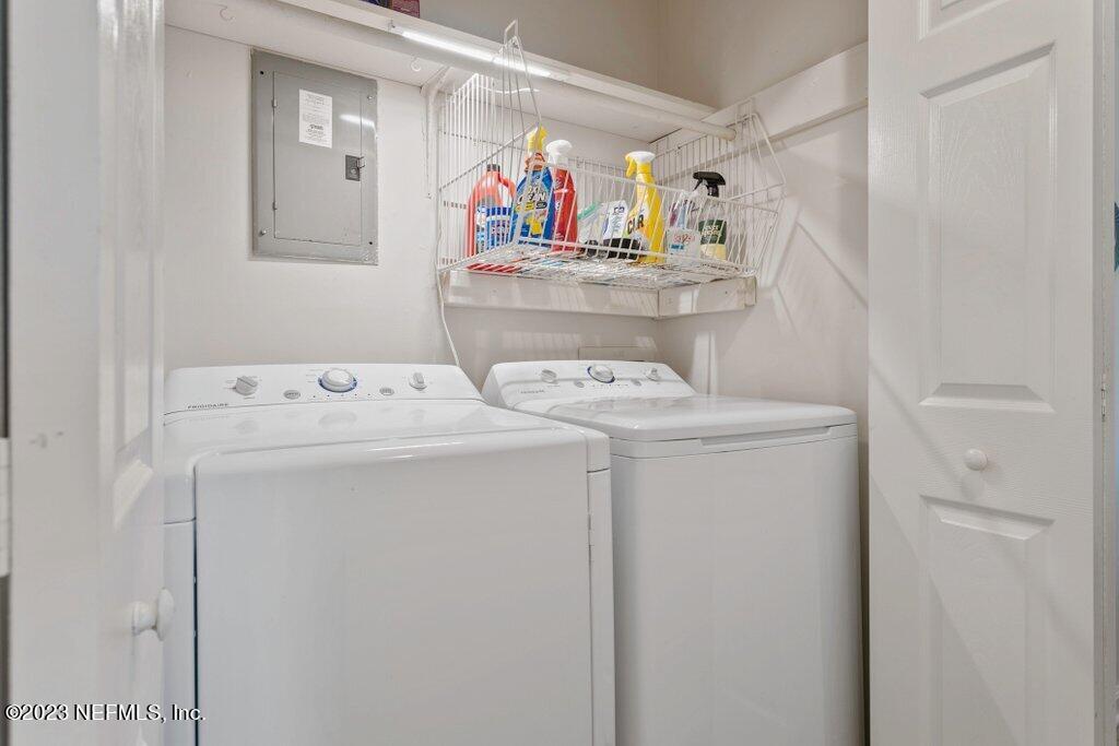 2694 Forest Ridge Drive, Unit 4A Fernandina Beach, FL 32034 - Photo 15 of 38 a utility room with dryer and washer