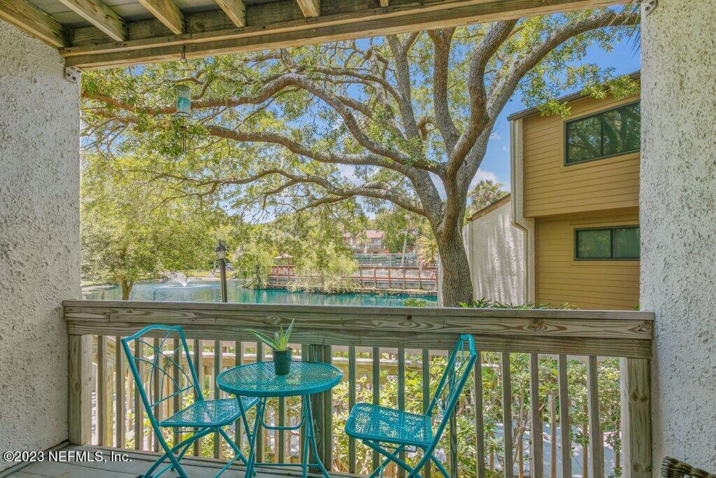 2694 Forest Ridge Drive, Unit 4A Fernandina Beach, FL 32034 - Photo 29 of 38 a view of a chair and table in the balcony
