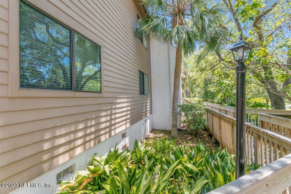 2694 Forest Ridge Drive, Unit 4A Fernandina Beach, FL 32034 - Photo 31 of 38 a view of a balcony with wooden floor