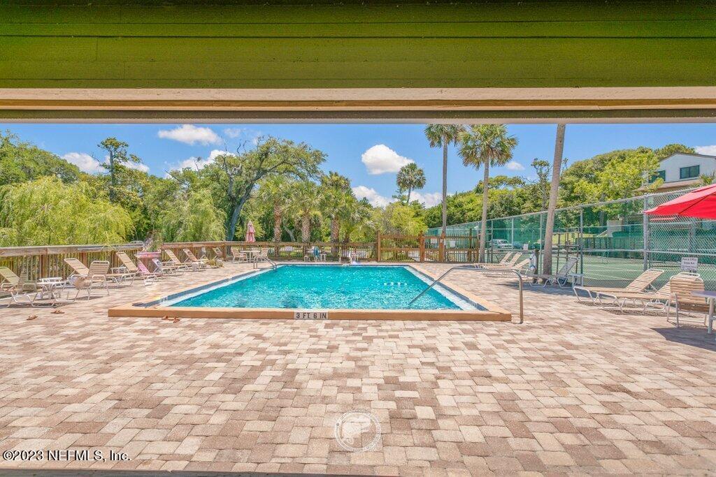 2694 Forest Ridge Drive, Unit 4A Fernandina Beach, FL 32034 - Photo 35 of 38 a view of outdoor space and swimming pool