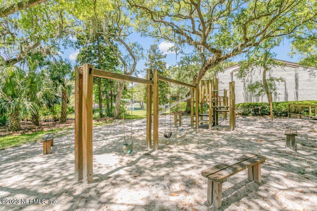 2694 Forest Ridge Drive, Unit 4A Fernandina Beach, FL 32034 - Photo 37 of 38 a view of a yard with plants