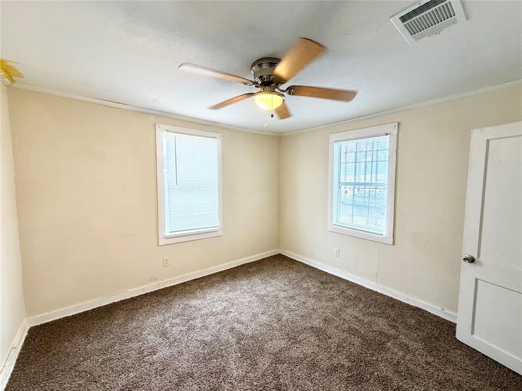 1140 Faulkner Lane Waco, TX 76704 - Photo 14 of 17 a view of an empty room with a window