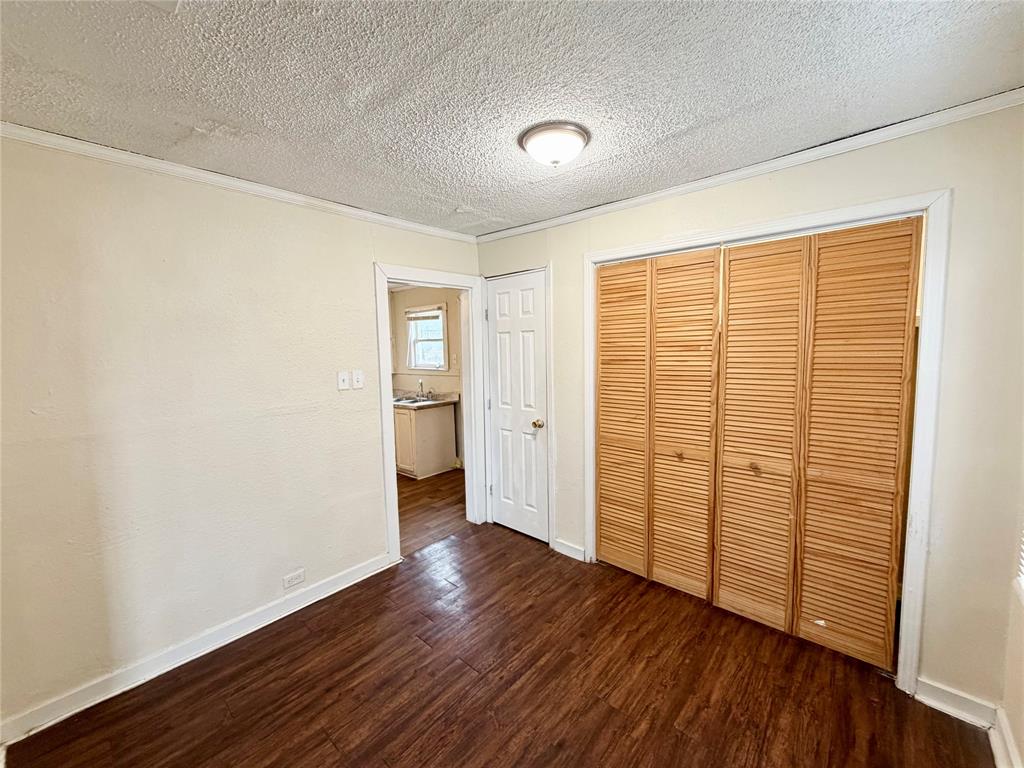 1140 Faulkner Lane Waco, TX 76704 - Photo 6 of 17 wooden floor in an empty room