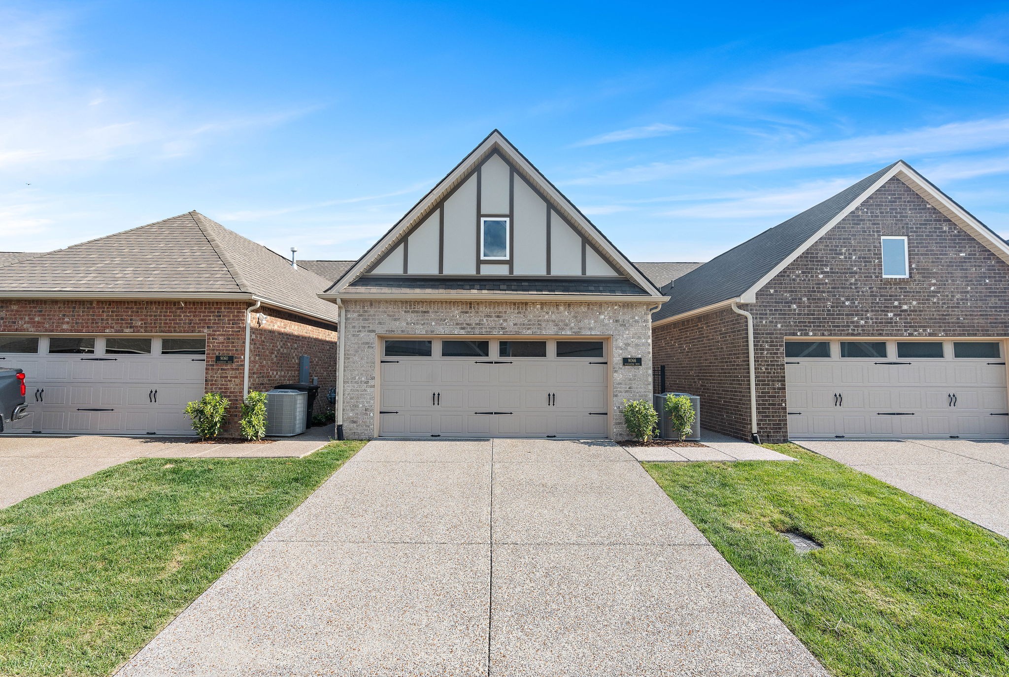 9066 Headwaters Drive Franklin, TN 37064 - Photo 23 of 24 a front view of a house with a yard and garage