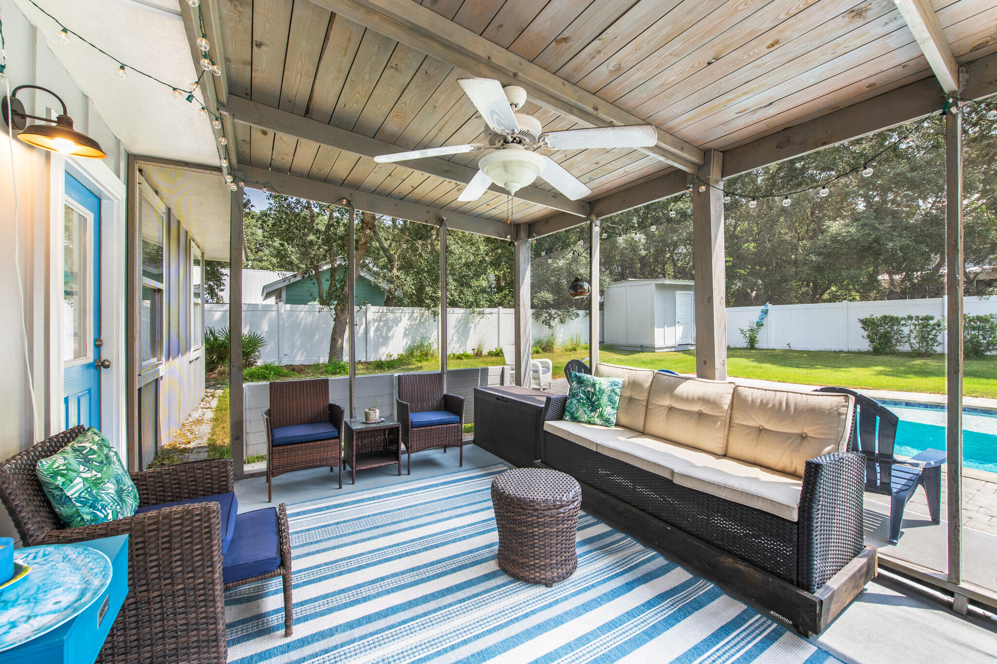 71 Sea Oates Road Santa Rosa Beach, FL 32459 - Photo 6 of 59 a outdoor space with patio the couches and a dining table with garden view