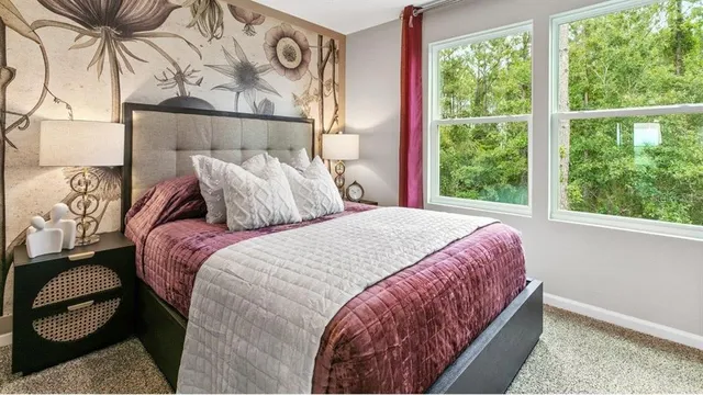 a bedroom with a bed and window