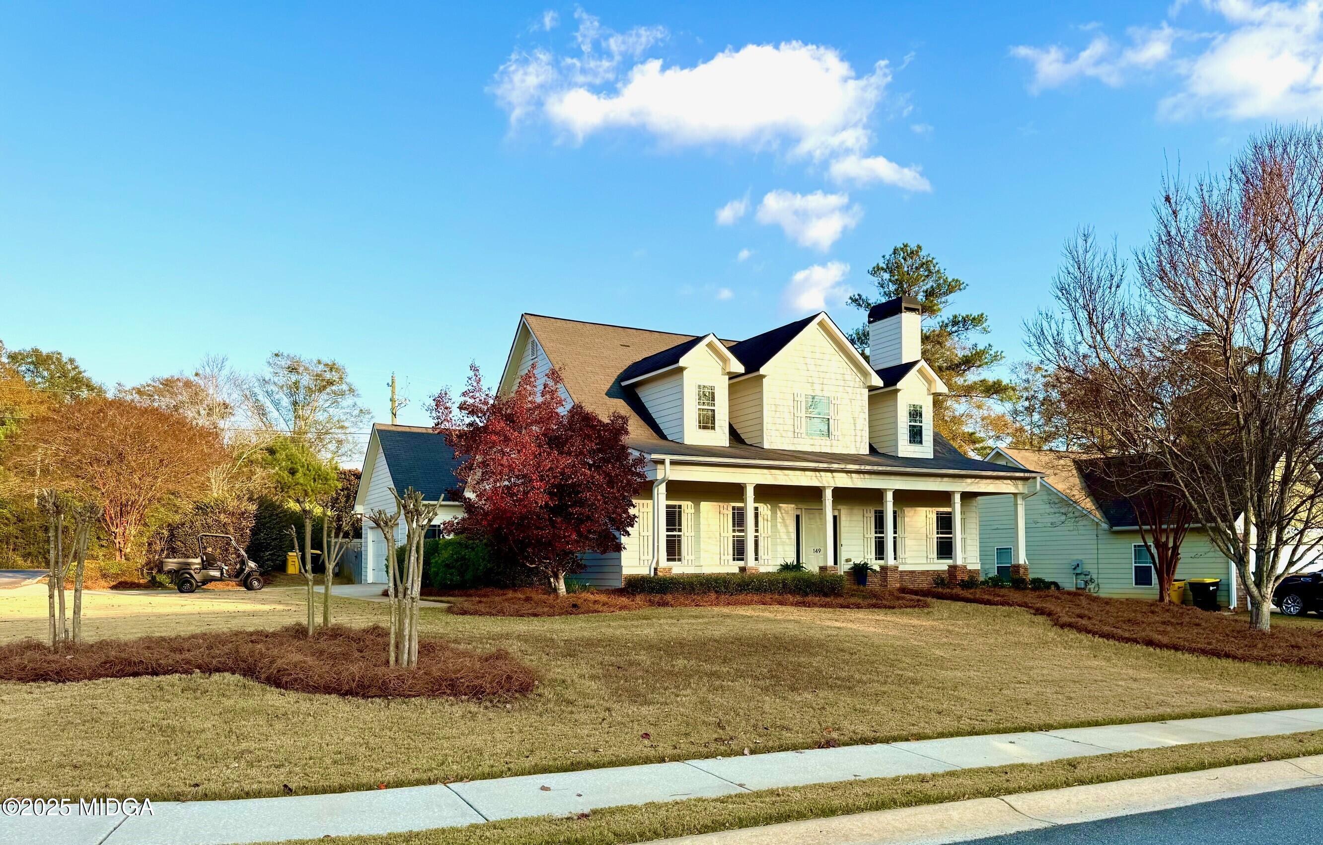 149 Presidents Way Forsyth, GA 31029 - Photo 22 of 26 a view of house with a yard