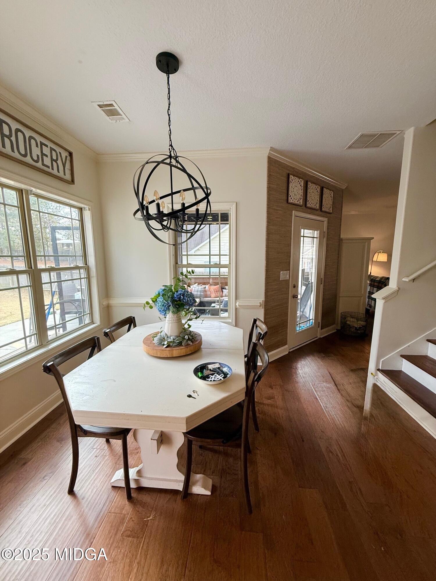 149 Presidents Way Forsyth, GA 31029 - Photo 5 of 26 a view of a dining room with furniture window and wooden floor