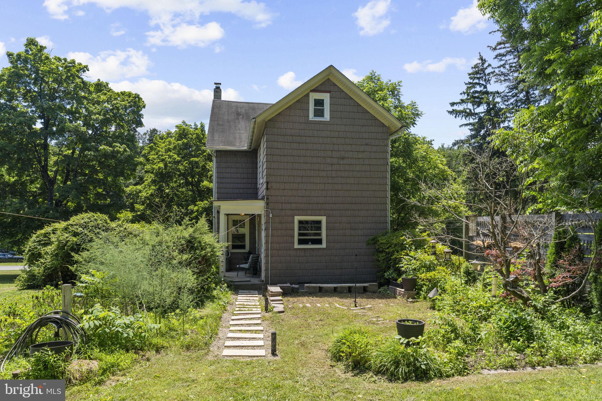 9039 Easton Road Ottsville, PA 18942 - Photo 29 of 61 a front view of a house with a yard