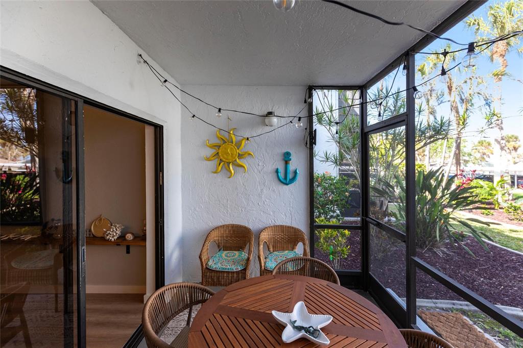 2955 North Beach Road, Unit B612 Englewood, FL 34223 - Photo 24 of 24 a bedroom with a bed and wooden floor