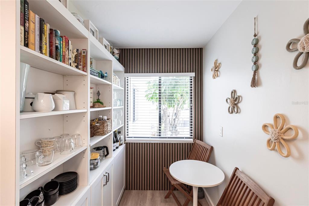 2955 North Beach Road, Unit B612 Englewood, FL 34223 - Photo 10 of 24 a bathroom with a sink a toilet and a window