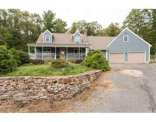 197 Douglas Road Warren, MA 01083 - Photo 1 of 28 a front view of a house with a garden