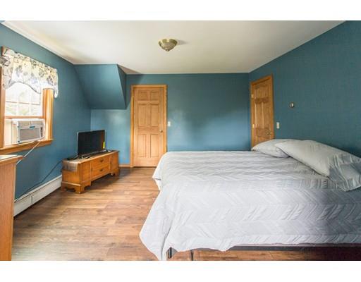197 Douglas Road Warren, MA 01083 - Photo 15 of 28 a bedroom with a bed and window