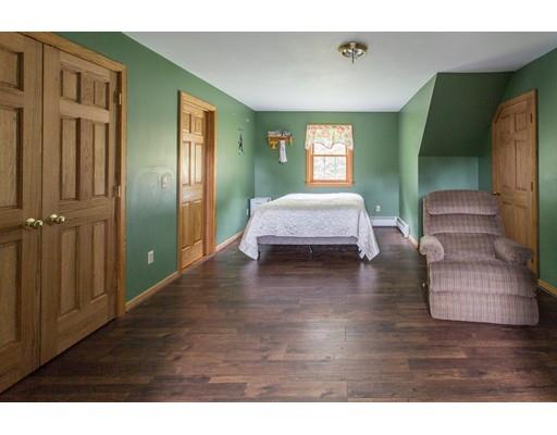 197 Douglas Road Warren, MA 01083 - Photo 18 of 28 a bedroom with furniture and a window