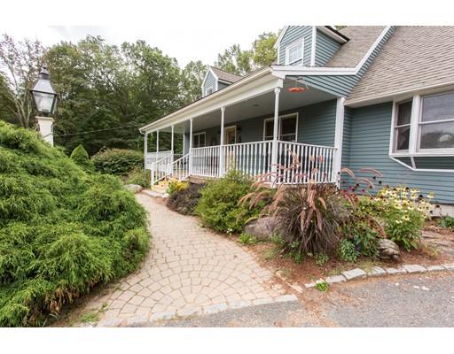 197 Douglas Road Warren, MA 01083 - Photo 2 of 28 a house view with a garden space