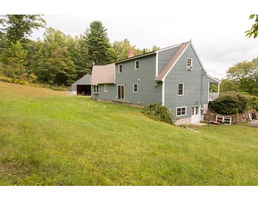197 Douglas Road Warren, MA 01083 - Photo 24 of 28 a view of a house with pool and a yard