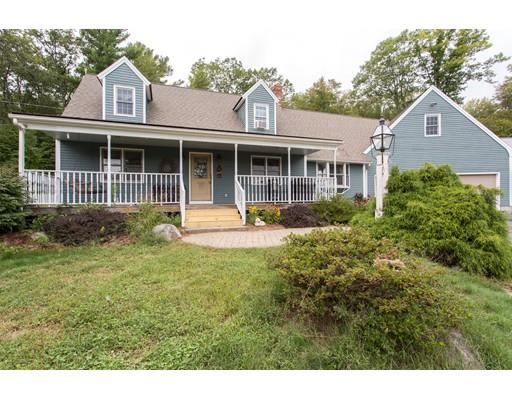 197 Douglas Road Warren, MA 01083 - Photo 27 of 28 a front view of a house with a yard
