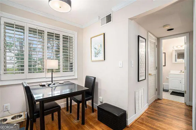 a view of a livingroom with furniture and window