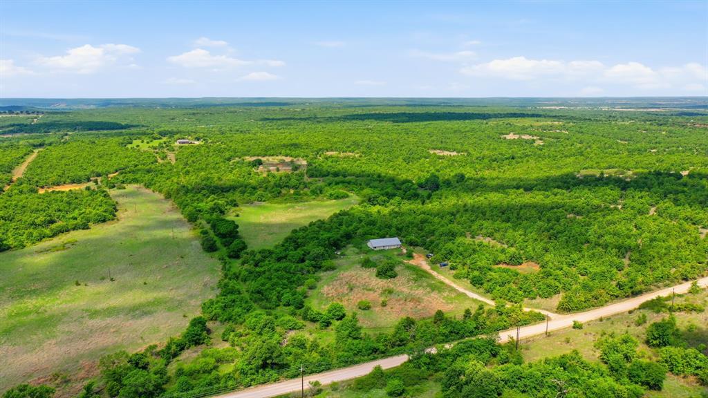 3180 Rock Creek Road Jacksboro, TX 76458 - Photo 2 of 17 a view of yard with ocean view