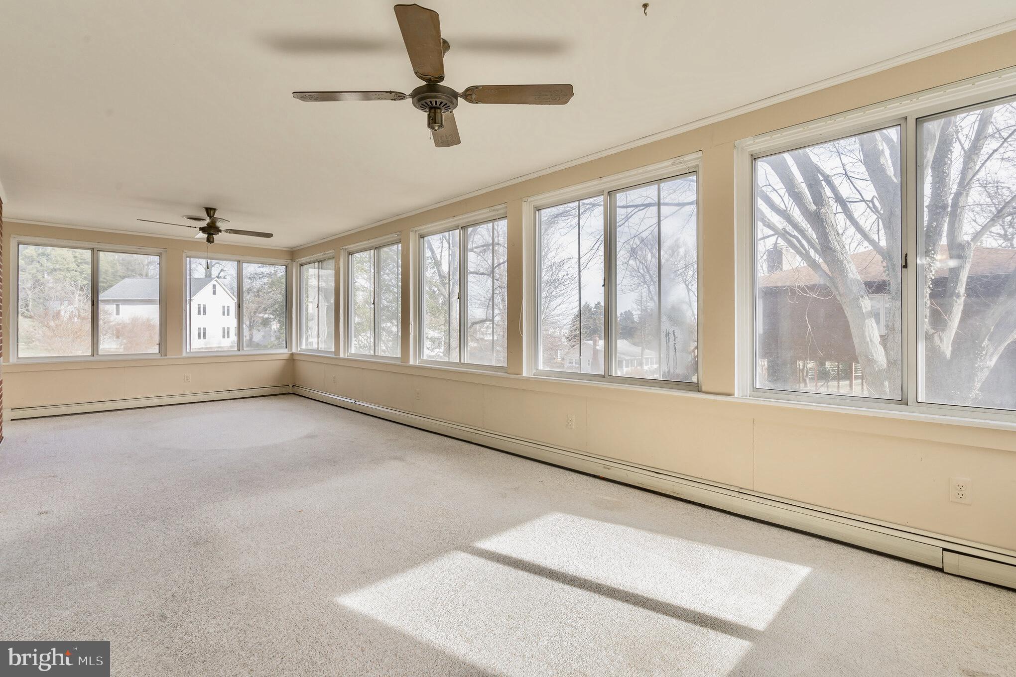 5101 Knoll Road Huntingtown, MD 20639 - Photo 8 of 38 Enjoy This Amazing Sun Room All Year Long!