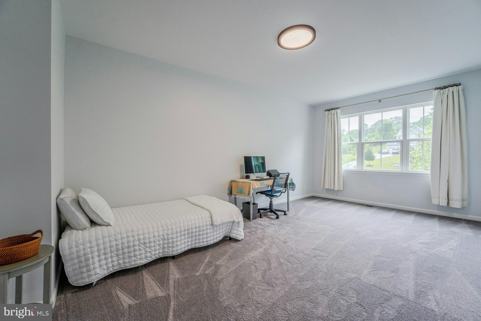 18120 Ridgewood Place Round Hill, VA 20141 - Photo 25 of 46 a living room with furniture and a window
