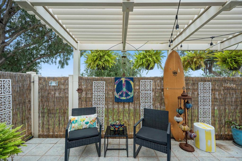 315 Volney Lane Encinitas, CA 92024 - Photo 20 of 51 a outdoor living space with furniture and a black umbrella
