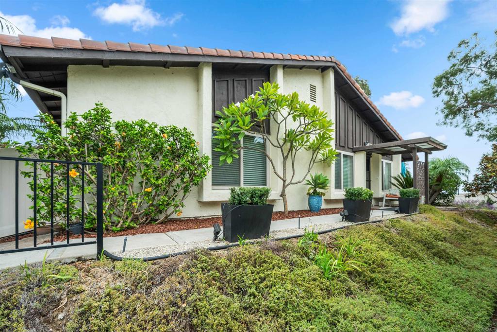 315 Volney Lane Encinitas, CA 92024 - Photo 2 of 51 a front view of a house with garden