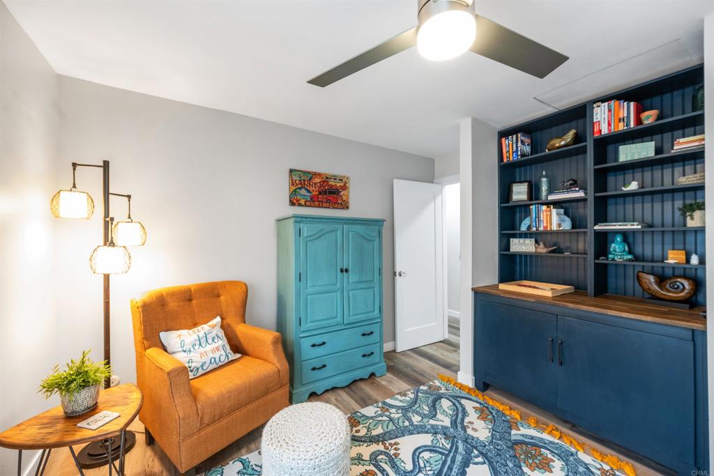 315 Volney Lane Encinitas, CA 92024 - Photo 24 of 51 a living room with furniture cabinets and window