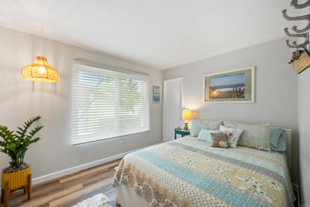 315 Volney Lane Encinitas, CA 92024 - Photo 28 of 51 a bedroom with a bed and a window