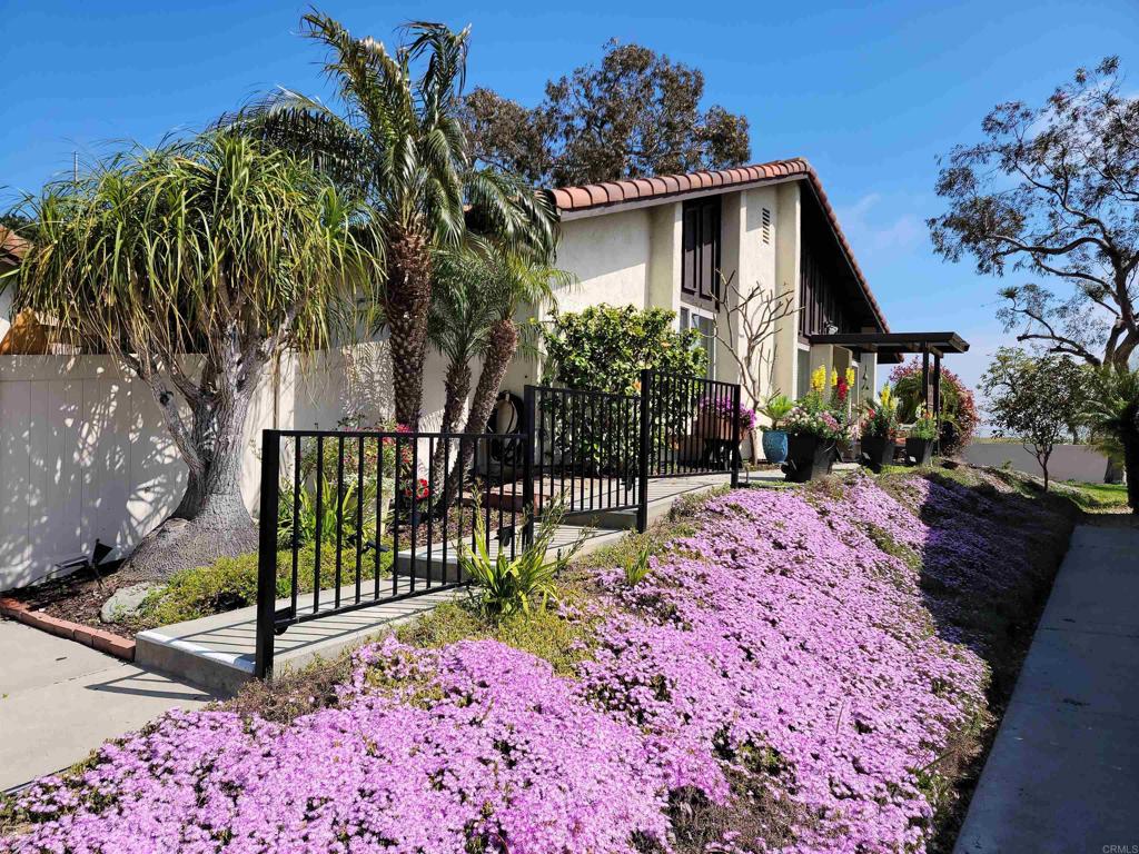 315 Volney Lane Encinitas, CA 92024 - Photo 3 of 51 a front view of a house with a yard